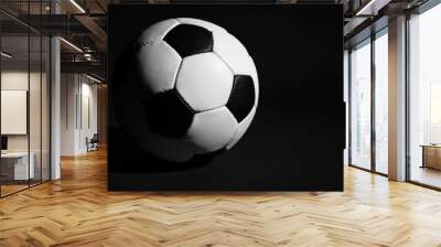 soccer ball on black background Wall mural