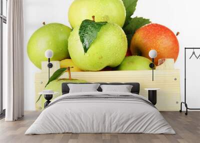 sweet apples in wooden crate, isolated on white Wall mural