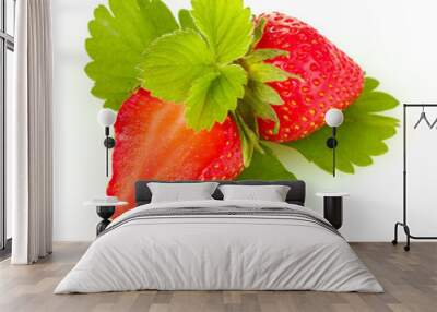 sweet ripe strawberries with leaves isolated on white Wall mural