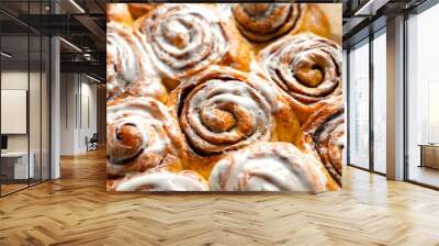 Tasty cinnamon rolls, closeup Wall mural