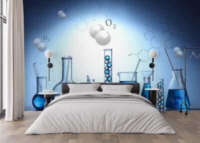 Test-tubes with blue liquid on blue background Wall mural