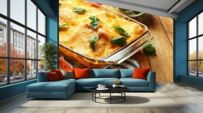 Traditional lasagna in glass baking dish and tomatoes on wooden table Wall mural