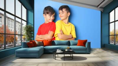 Twin brothers on blue background Wall mural