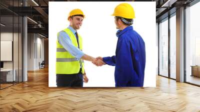 Two engineers shaking hands  isolated on white Wall mural