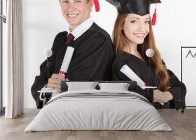 two happy graduating students isolated on white Wall mural