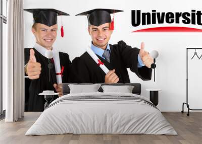 two happy graduating students isolated on white Wall mural