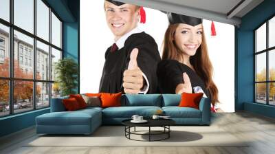 two happy graduating students isolated on white Wall mural