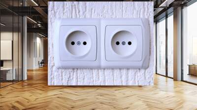 Two sockets  on wall Wall mural