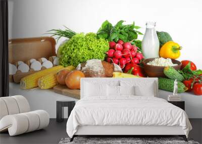 Vegetables and dairy products isolated on white Wall mural