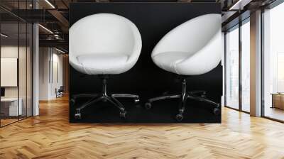 white chairs on black background Wall mural