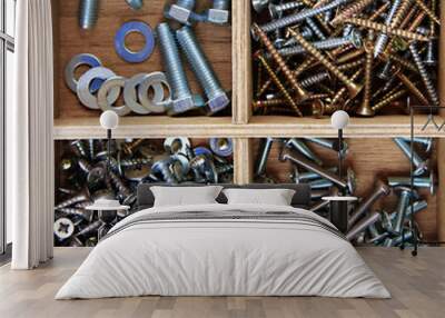 Wooden box for metal bolts, screws and nuts close up Wall mural