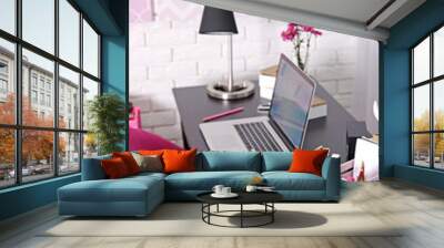 Workplace with laptop on table at home Wall mural