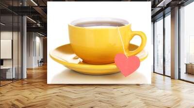 Yellow cup and saucer isolated on white Wall mural