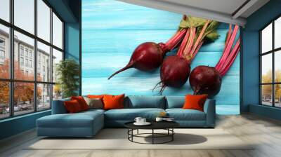 Young beets on wooden table Wall mural