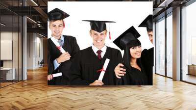 Young graduates isolated on white Wall mural