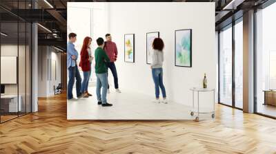 Young people in modern art gallery hall Wall mural