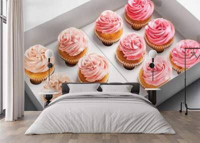 Yummy cupcakes in box on white background Wall mural