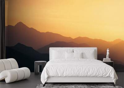 epic sunset above mountain layers in the alps Wall mural