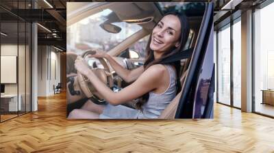 woman sitting in the car Wall mural