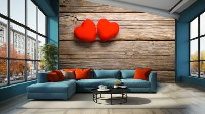 Valentine's Day ,  red velvet hearts on old wooden floor Wall mural