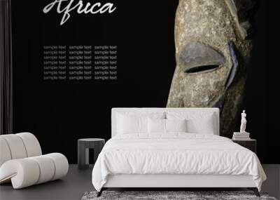 African mask over black background Wall mural