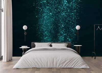 Close up of air bubbles in the water on dark background Wall mural