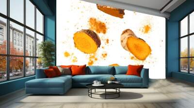 Fresh turmeric root falling in the air isolated Wall mural