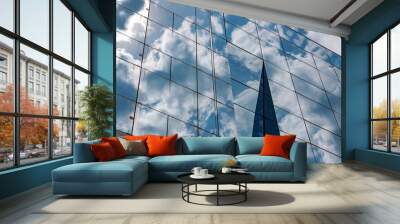 Business building with cloud reflections. Wall mural