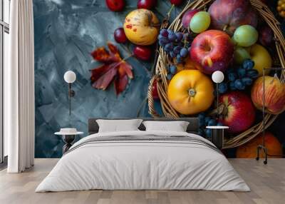 Photo of fresh, colorful autumn fruits in the basket Wall mural