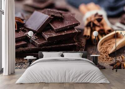 chocolate bar pieces. background with chocolate. sweet food photo concept. the chunks of broken choc Wall mural