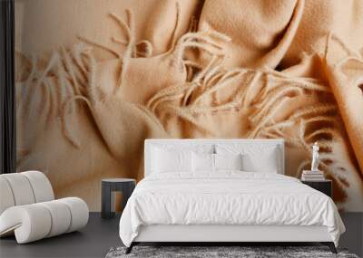 A soft beige blanket background. Wall mural