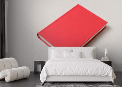 Big red book isolated on grey background, copy space. Wall mural