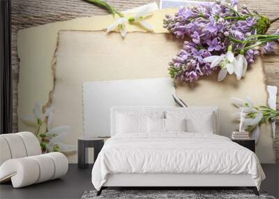 Lilacs and snowdrop anemone flowers (Anemone sylvestris) on vint Wall mural