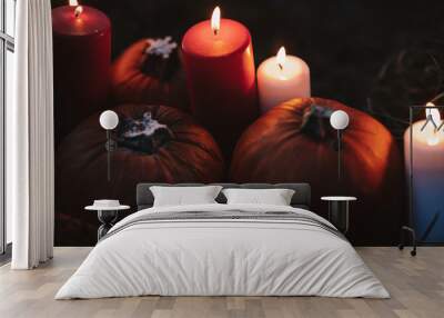 Burning halloween candles with pumpkins Wall mural