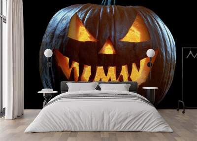 Glowing Halloween pumpkin with sharp teeth Wall mural