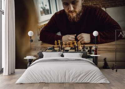 Couple playing chess. Wall mural