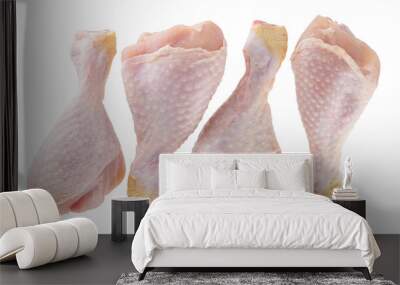 raw chicken legs isolated on white background Wall mural