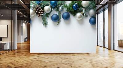 Christmas decoration with blue baubles on white background Wall mural