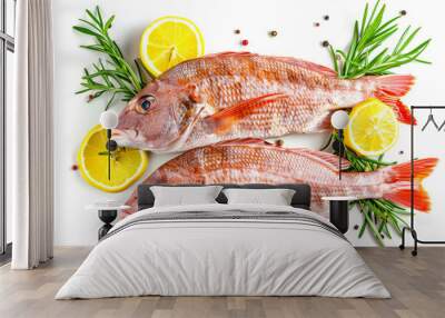 Fresh sea fish with lemon, herbs and spices on white background Wall mural