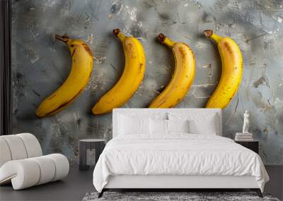 Ripe yellow bananas on a gray background Wall mural