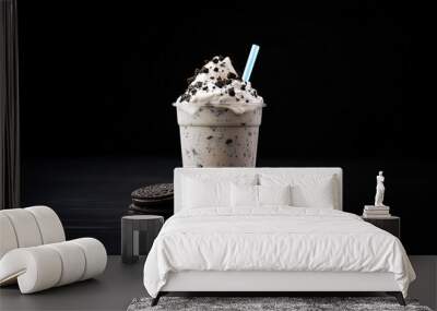 Cookies and cream milkshake in a takeaway cup isolated on dark background Wall mural