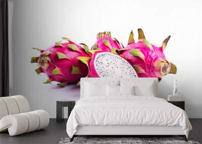 Delicious cut and whole dragon fruits (pitahaya) isolated on white background Wall mural