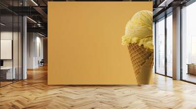 yellow ice cream with waffle cone isolated on a yellow background, mango, banana, lemon, pineapple ice cream, copy space Wall mural