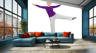 happy charming beautiful elderly woman doing exercises while working out playing sports. On a white background Wall mural