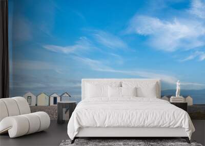 beach huts in cayeux s mer in french normandy under blue sky Wall mural