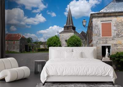 church and houses in typical french ardennes village Wall mural