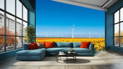 yellow tulips and wind turbines under blue sky in the netherlands Wall mural