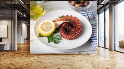 greek grilled octopus on white plate Wall mural