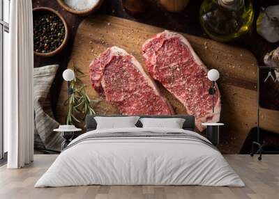 seasoned raw sirloin beef steak on cutting board Wall mural