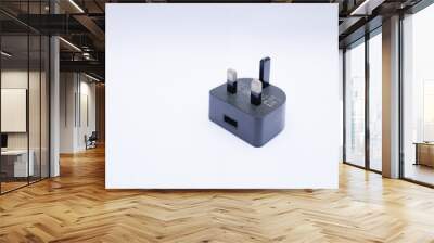 Black USB charger head/adapter isolated on a white background Wall mural